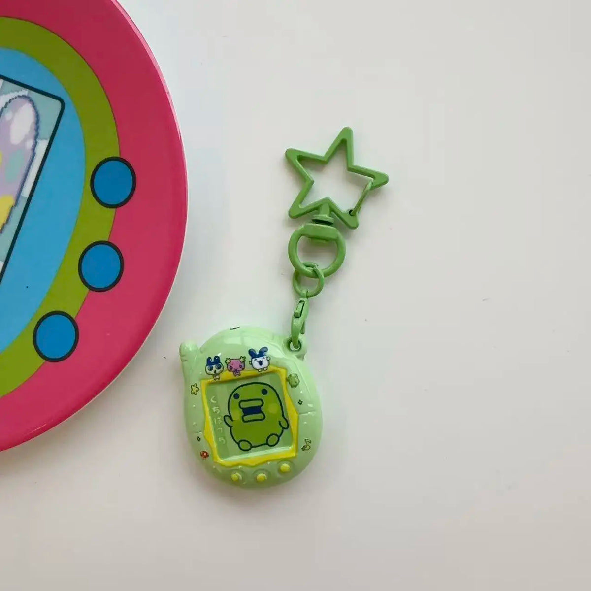 Tamagotchi Mini Cartoon Keychain - Cute Virtual Pet Pendant for Phones, Bags and Gaming Accessories
