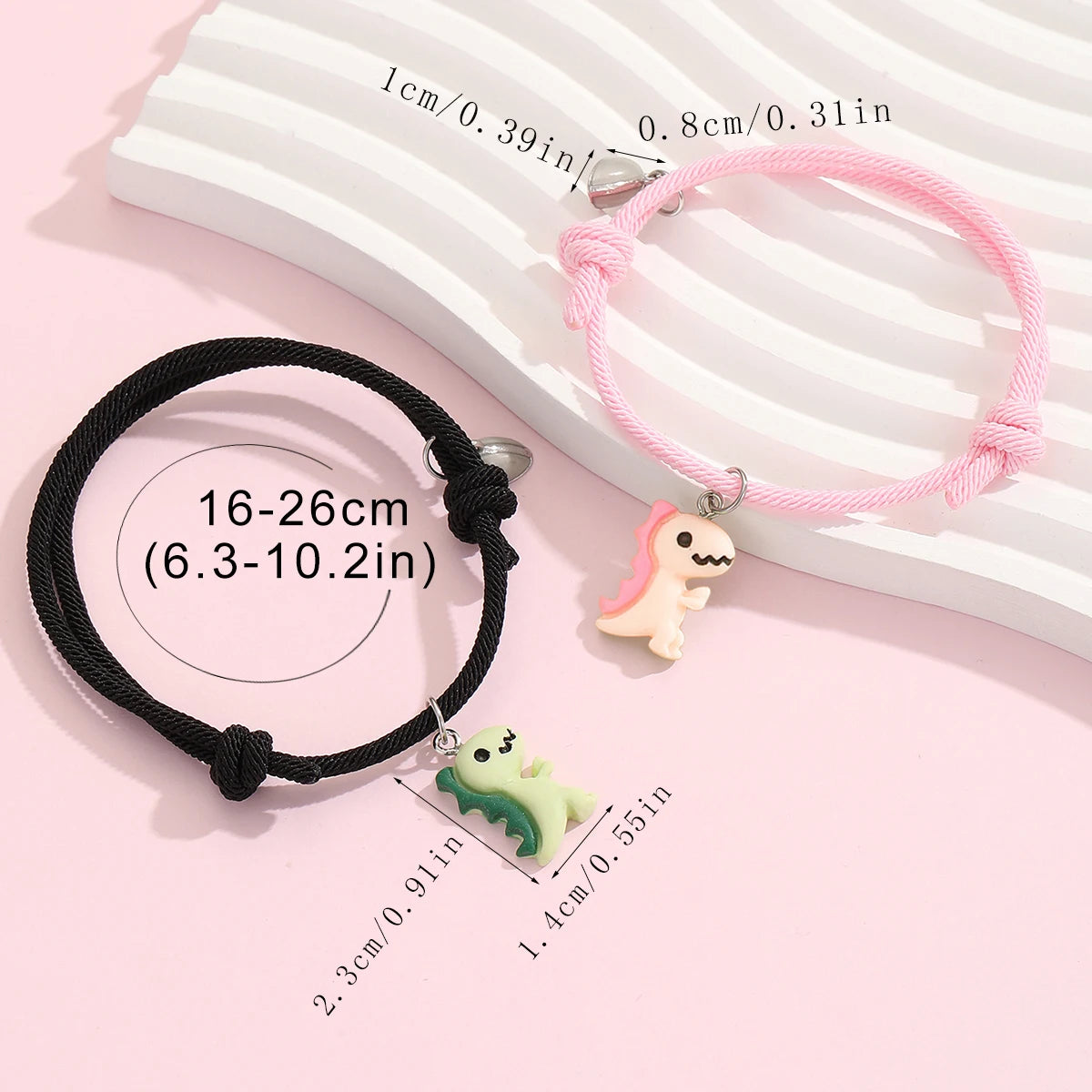 Couple Dinosaur Bracelets – 2-Piece Set, Luminous Peach Heart Pendants, Green and Pink Hand-Woven Bracelets
