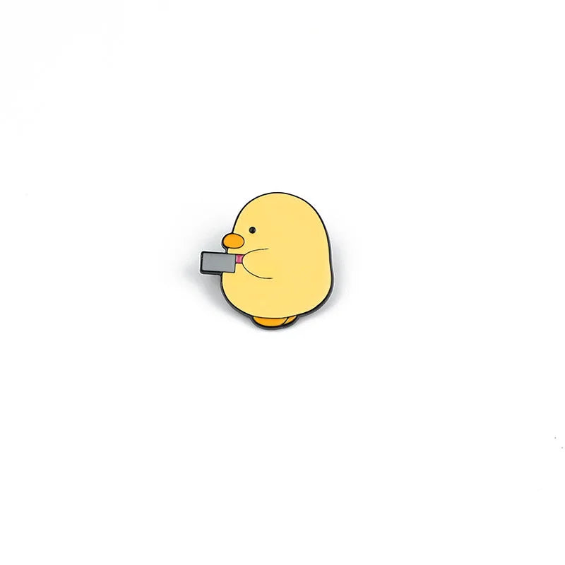 Cute Yellow Duck with Knife Enamel Brooch – Fun Cartoon Metal Pin, Creative Personality Badge & Best Friend Gift