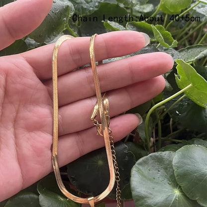 Stainless Steel Crescent Moon Pendant Necklace - Curved Horn-Inspired Flat Blade Snake Chain Jewelry for Women