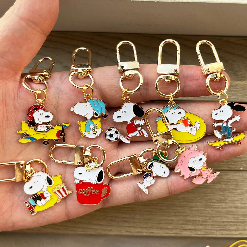 9-Piece Snoopy Cartoon Metal Keychain Set - Cute Kawaii Bag Charms and Backpack Decorations for Gifts and Collectors