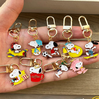 9-Piece Snoopy Cartoon Metal Keychain Set - Cute Kawaii Bag Charms and Backpack Decorations for Gifts and Collectors