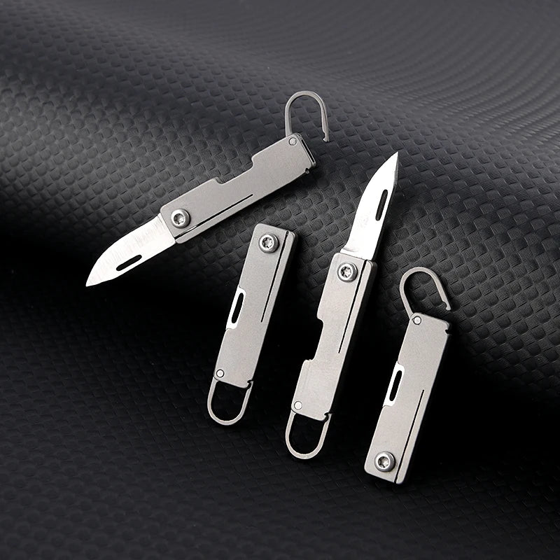 Portable Titanium Alloy Mini Folding Knife Keychain – Sharp Compact Unboxing Tool Pendant