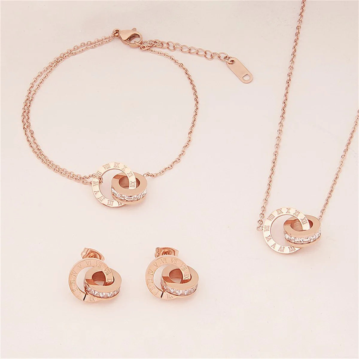 Titanium Steel Roman Digital Jewelry Set - Double Ring Pendant Necklace, Bracelet, and Earrings for Women