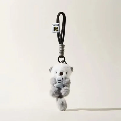 Cute Otter Plush Keychain - Otters Holding Fish Pendant for Backpack, Bag & Wallet Decor