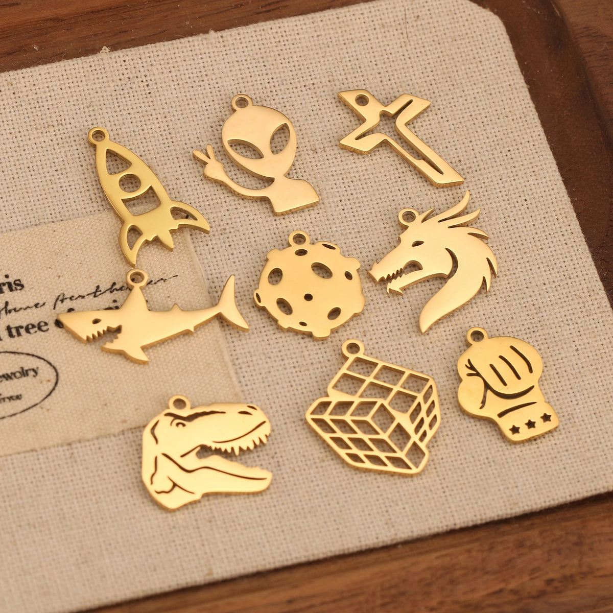 5-Piece Stainless Steel Charm Set - Magic Cube, Cross, Space Rocket, Boxing Glove, and Dinosaur DIY Jewelry Pendants