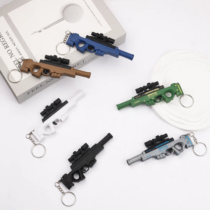 Mini Gun Toy Keychain - Mini Ball-Firing Pendant for Backpacks and Novelty Gifts
