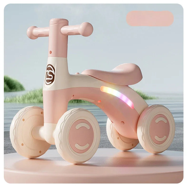 Anti-Tip Baby Balance Bike — 4-Wheel Silent Glider Walker for Ages 1-3, Toddler Training Ride-On with Safety Wheels for Indoor & Outdoor Use