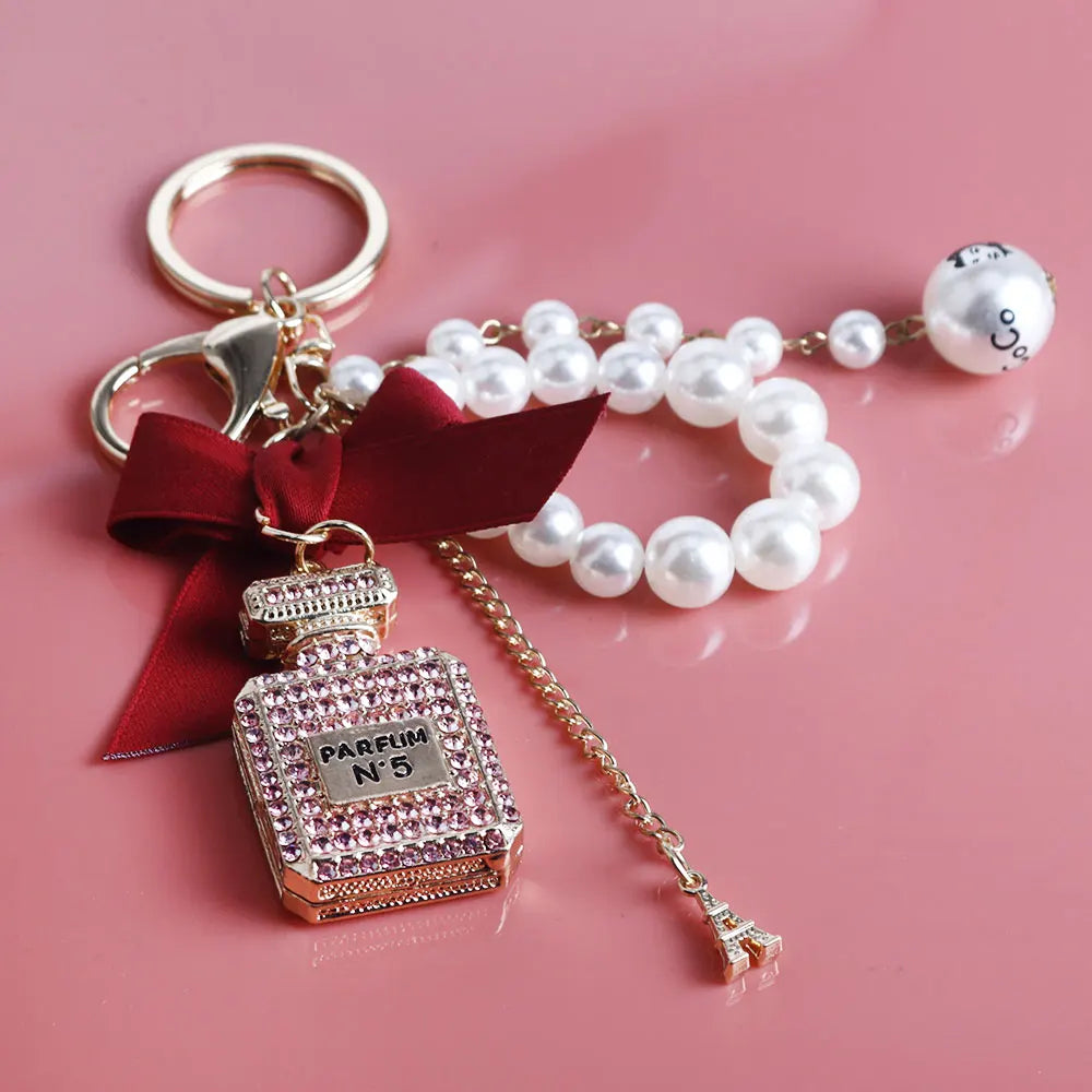 Fashion Pearl Perfume Bottle Keychain — Cute Bow Car & Bag Charm for Women, Creative Key Ring Accessory