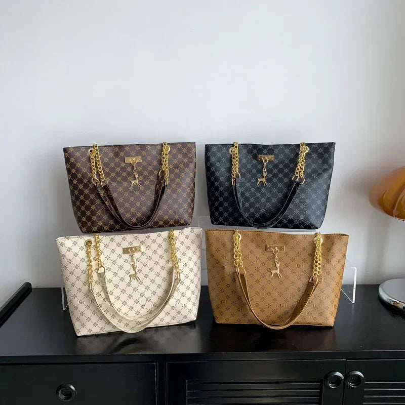 Women’s Large Capacity PU Leather Handbag — Fashion Tote Bag with Textured Design and Hanging Accessories