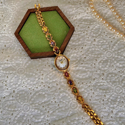 Luxury Women's Watch – Oval Mother-of-Pearl Dial with Tourmalines & Diamond Accents ✨⌚