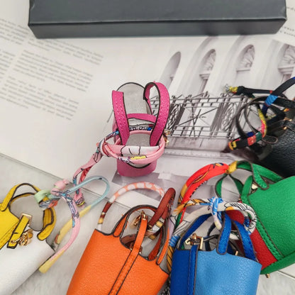 Mini Bag Pendant Keychain – Creative Portable Zero Wallet, Bracelet, and Bluetooth Earphone Multifunctional Hanging Accessory