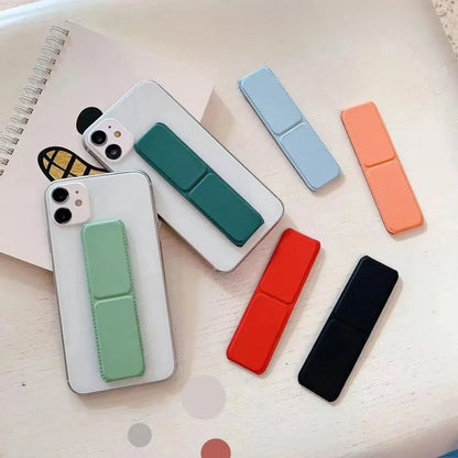 Folding Phone Stand - Self-Adhesive Desktop Sticky Back Phone Holder with Simple Push-Pull Design