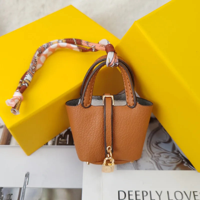 Mini Bag Pendant Keychain – Creative Portable Zero Wallet, Bracelet, and Bluetooth Earphone Multifunctional Hanging Accessory