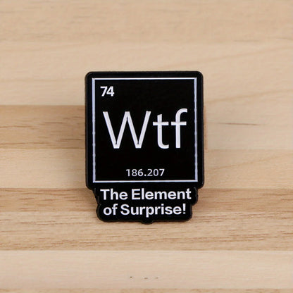 The Element of Surprise Enamel Pin — Black WTF Lapel Pin for Backpacks & Clothing