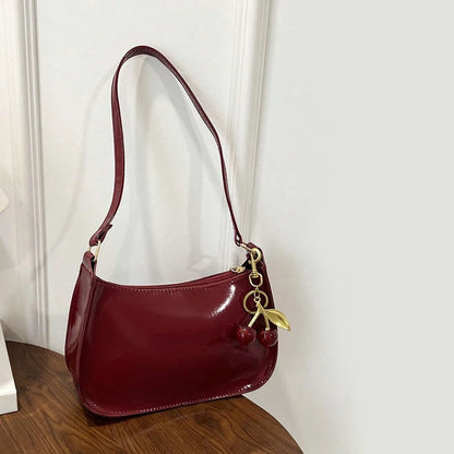 Women's PU Leather Shoulder Handbag – Solid Color Versatile Underarm Bag with Cherry Pendant Casual Commuting Purse