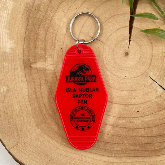 Jurassic Park Red Raptor Keychain – Isla Nublar Dinosaur Pen Key Tag, Retro Collector’s Gift