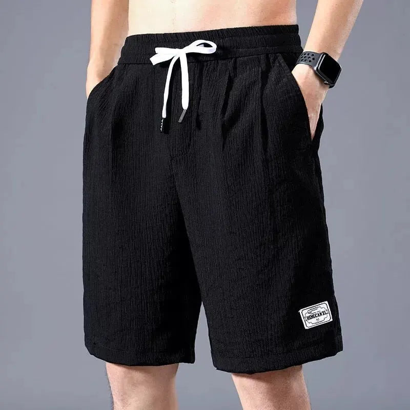 Men’s Ice Silk Sports Shorts – Loose, Breathable Cropped Pants for Casual Wear (XL-XXXL)