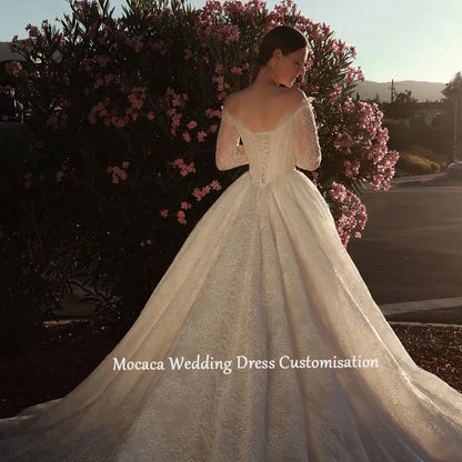 Mocaca 2026 Sweetheart Wedding Dress - Long-Sleeve Princess Gown with Glitter Detail & Court Train