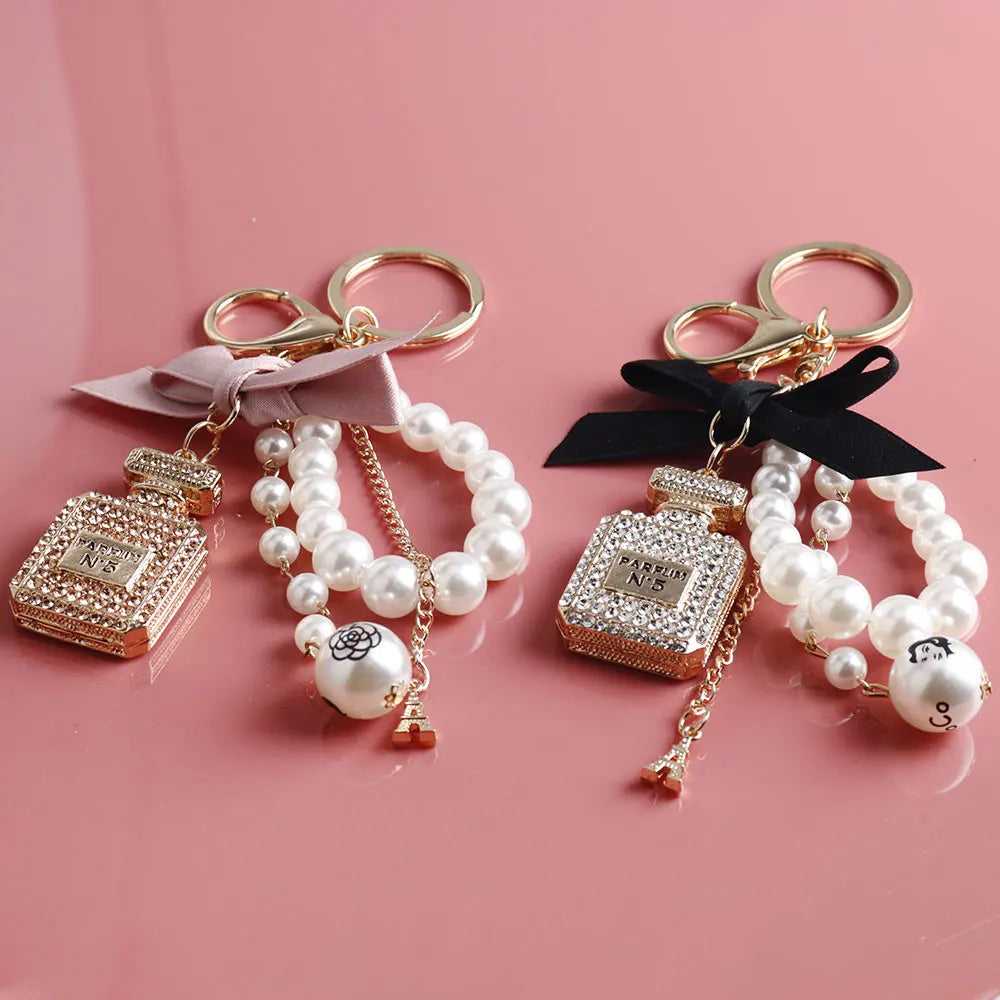 Fashion Pearl Perfume Bottle Keychain — Cute Bow Car & Bag Charm for Women, Creative Key Ring Accessory