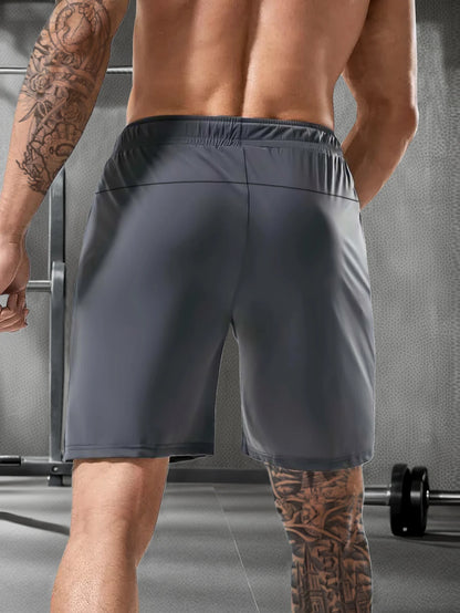 Men’s Solid Color Casual Shorts – Elastic Waist with Drawstring and Zipper Pockets, Loose Fit High Elasticity