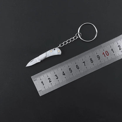 Mini EDC Folding Knife - Sharp Camping and Outdoor Pocket Tool, Key Pendant Gift for Dismantling and Express Cutting