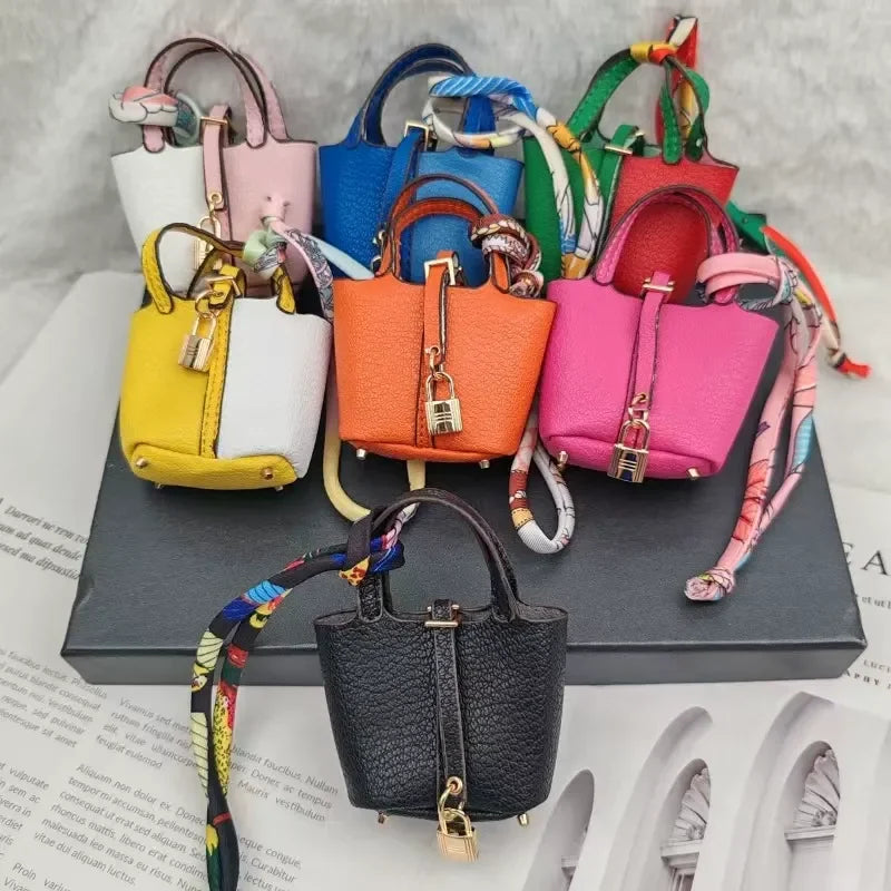 Mini Bag Pendant Keychain – Creative Portable Zero Wallet, Bracelet, and Bluetooth Earphone Multifunctional Hanging Accessory