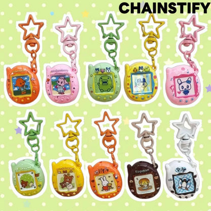 Tamagotchi Mini Cartoon Keychain - Cute Virtual Pet Pendant for Phones, Bags and Gaming Accessories