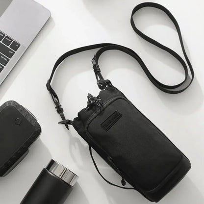 Unisex Water Bottle Carrier Bag with Strap – Insulated Crossbody Sling with Phone Pocket for Travel & Outdoor Use