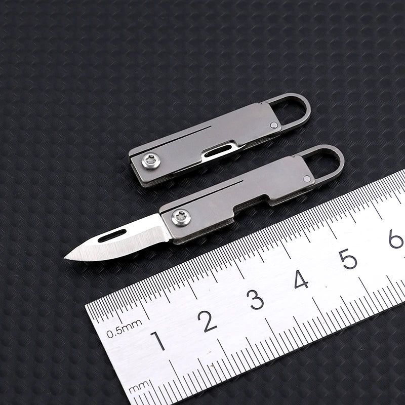 Portable Titanium Alloy Mini Folding Knife Keychain – Sharp Compact Unboxing Tool Pendant