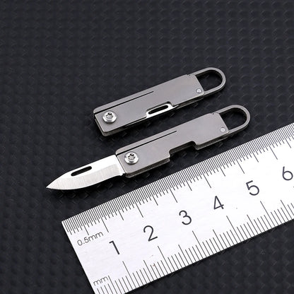 Portable Titanium Alloy Mini Folding Knife Keychain – Sharp Compact Unboxing Tool Pendant
