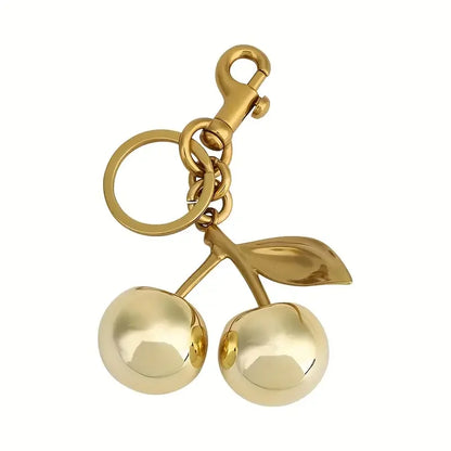 Golden Cherry Keychain Charm — Shiny Resin & Metal Bag Accessory, Elegant Gift for Women