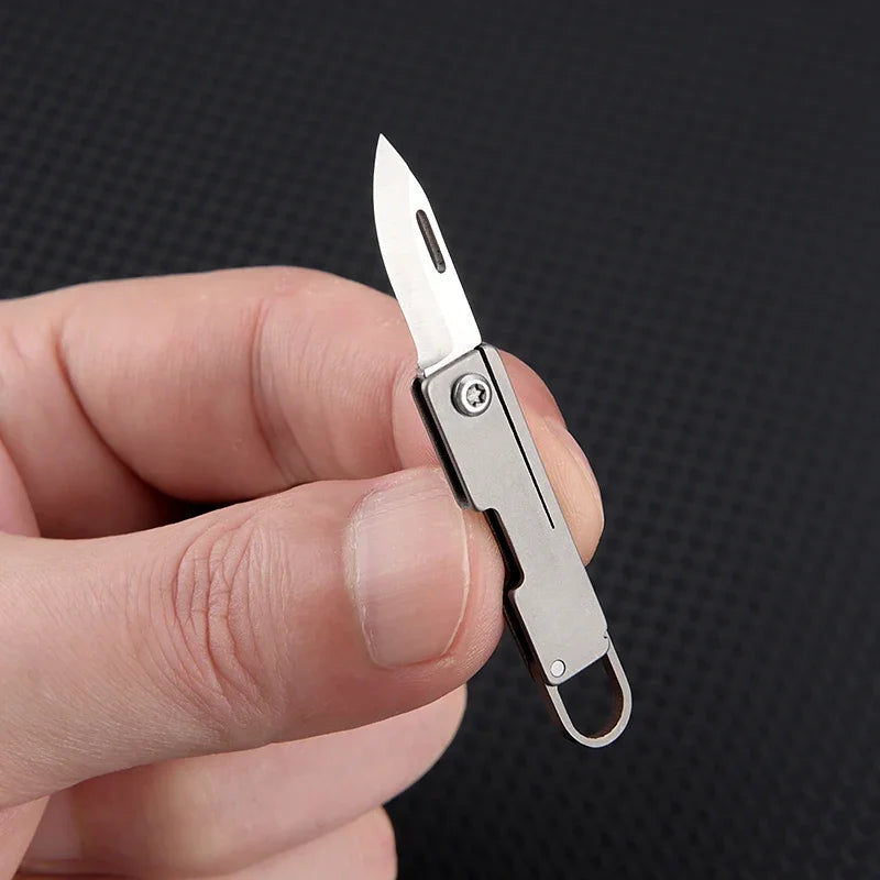 Portable Titanium Alloy Mini Folding Knife Keychain – Sharp Compact Unboxing Tool Pendant