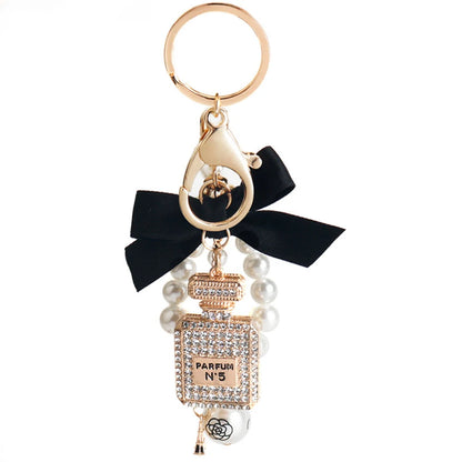 Fashion Pearl Perfume Bottle Keychain — Cute Bow Car & Bag Charm for Women, Creative Key Ring Accessory