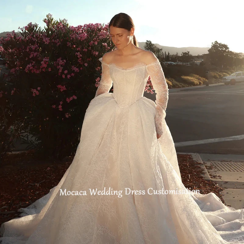 Mocaca 2026 Sweetheart Wedding Dress - Long-Sleeve Princess Gown with Glitter Detail & Court Train