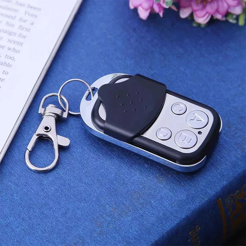 Universal 4 Button Garage Door Opener Remote 433MHz Clone Fixed Learning Rolling Code Duplicator