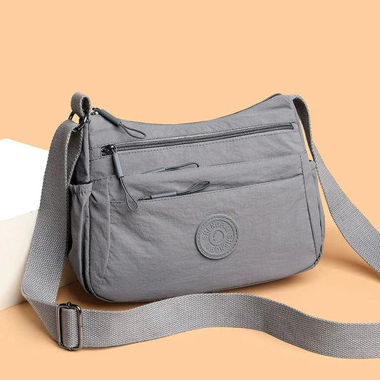 Women’s Multi-Layer Crossbody Bag – Solid Color Multi-Pocket Casual Shoulder Bag for Travel, Commuting & Everyday Use