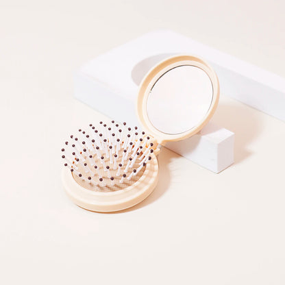 Mini Folding Head Massager & Mirror – Anti-Static Styling Comb for Wigs, Portable Travel Hair Brush