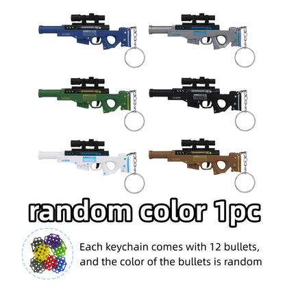 Mini Gun Toy Keychain - Mini Ball-Firing Pendant for Backpacks and Novelty Gifts