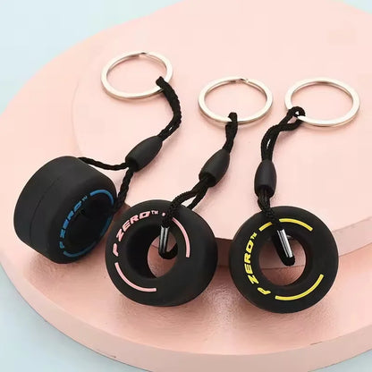 Mini F1 Racing Tire Keychain – Luxury Car Key Accessory & PVC Tire Pendant for Men, Car Lovers & Gifts