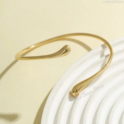 Lacteo Geometric Twisted Upper Arm Cuff Bracelet – Adjustable Water Drop Bangle for Women
