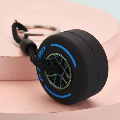 Mini F1 Racing Tire Keychain – Luxury Car Key Accessory & PVC Tire Pendant for Men, Car Lovers & Gifts
