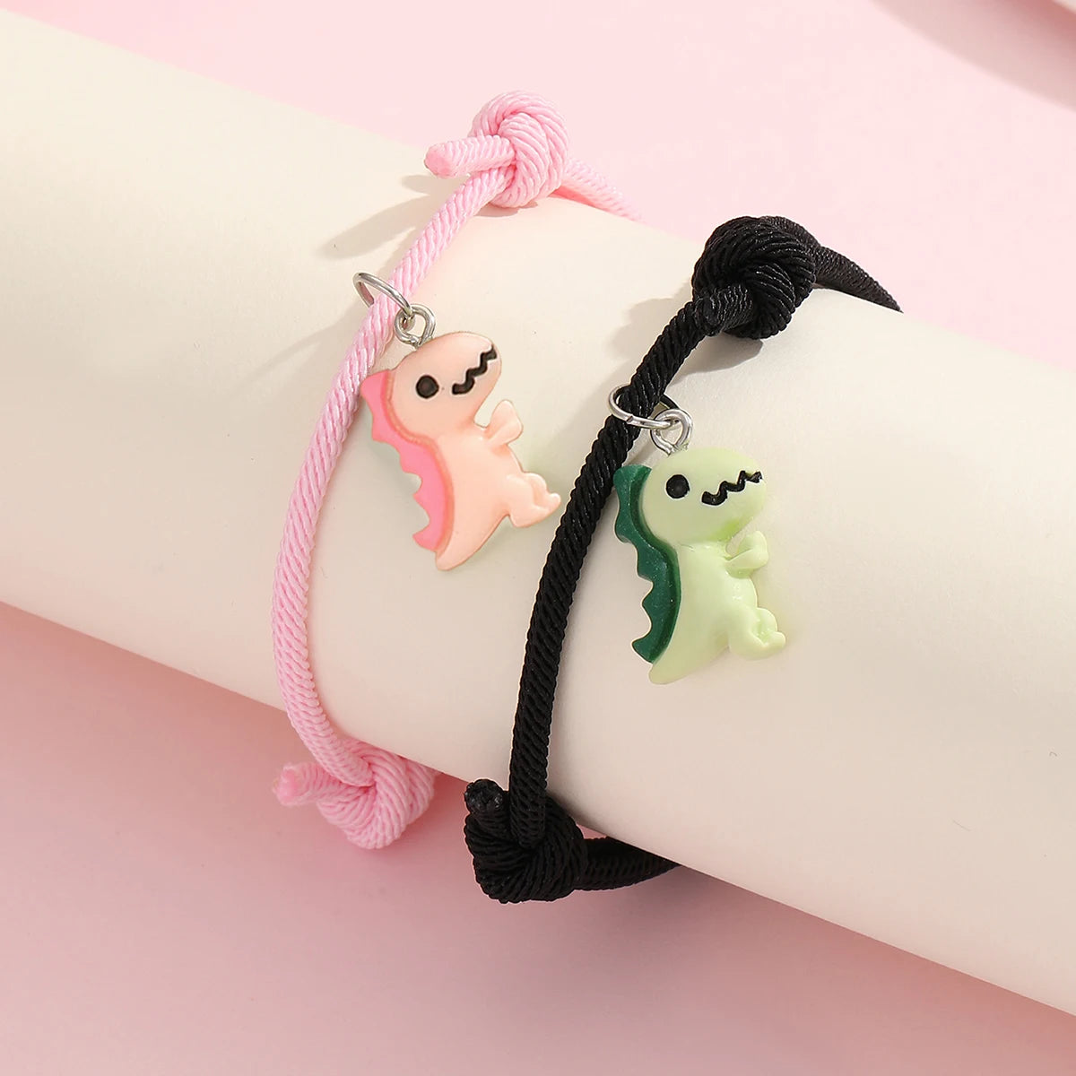 Couple Dinosaur Bracelets – 2-Piece Set, Luminous Peach Heart Pendants, Green and Pink Hand-Woven Bracelets